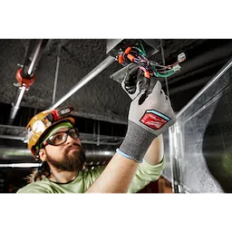 Worker wearing the Cut 2 High-Dexterity Gloves on the jobsite