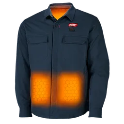 The M12™ Heated Shirt Jacket is dark blue, long-sleeved, and features visible heating elements in the lower front panels. It has two chest pockets and is branded with the logo stitched on the left side of the chest and inside the collar.