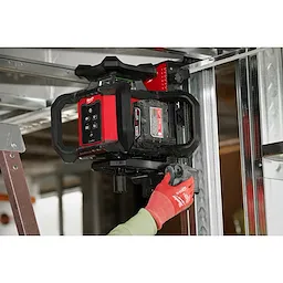 Image of the Milwaukee M18 Green Interior Rotary Laser Level Kit w/ Remote/Receiver & Wall Mount Bracket being used by a worker on a jobsite