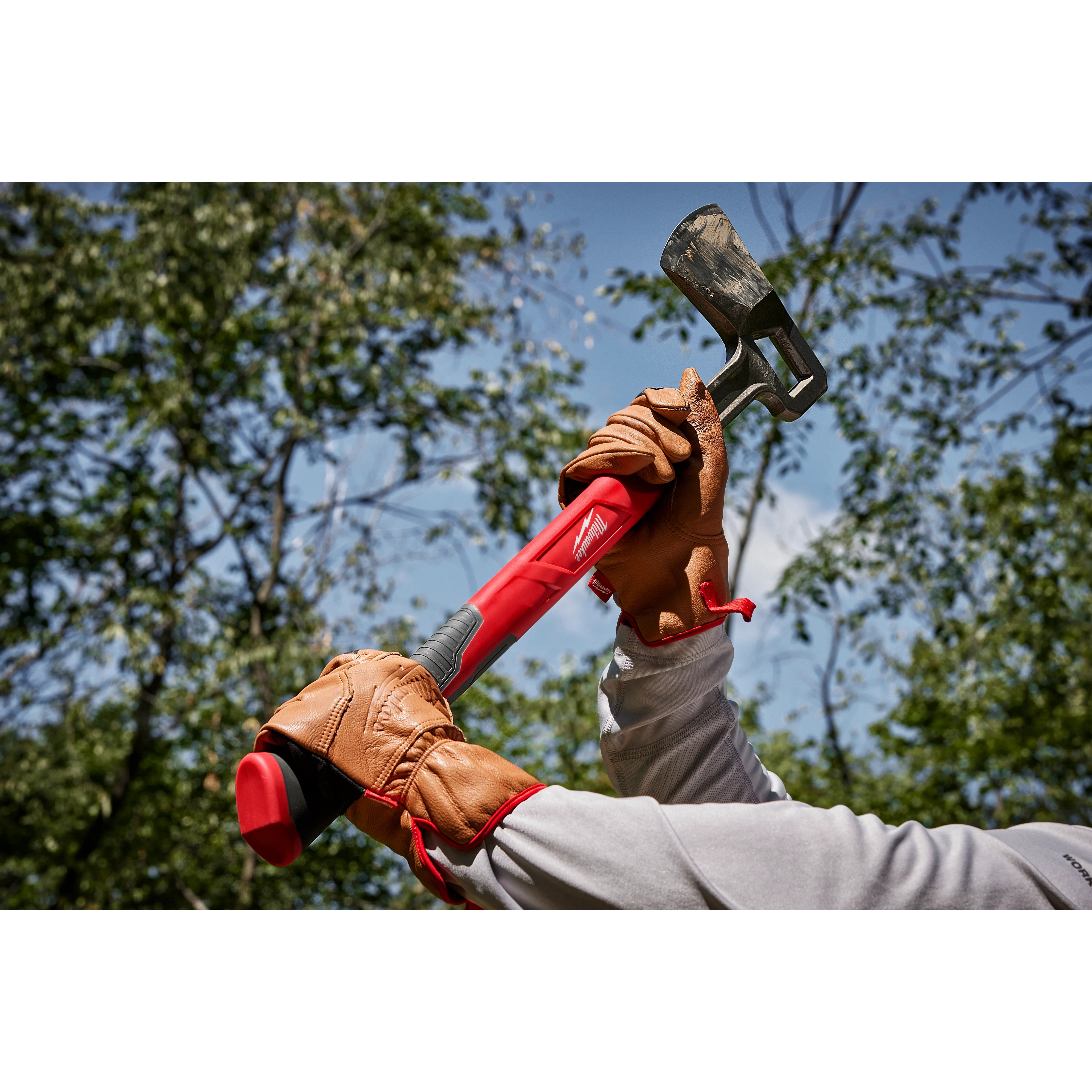 Worker using the 26” Splitting Axe