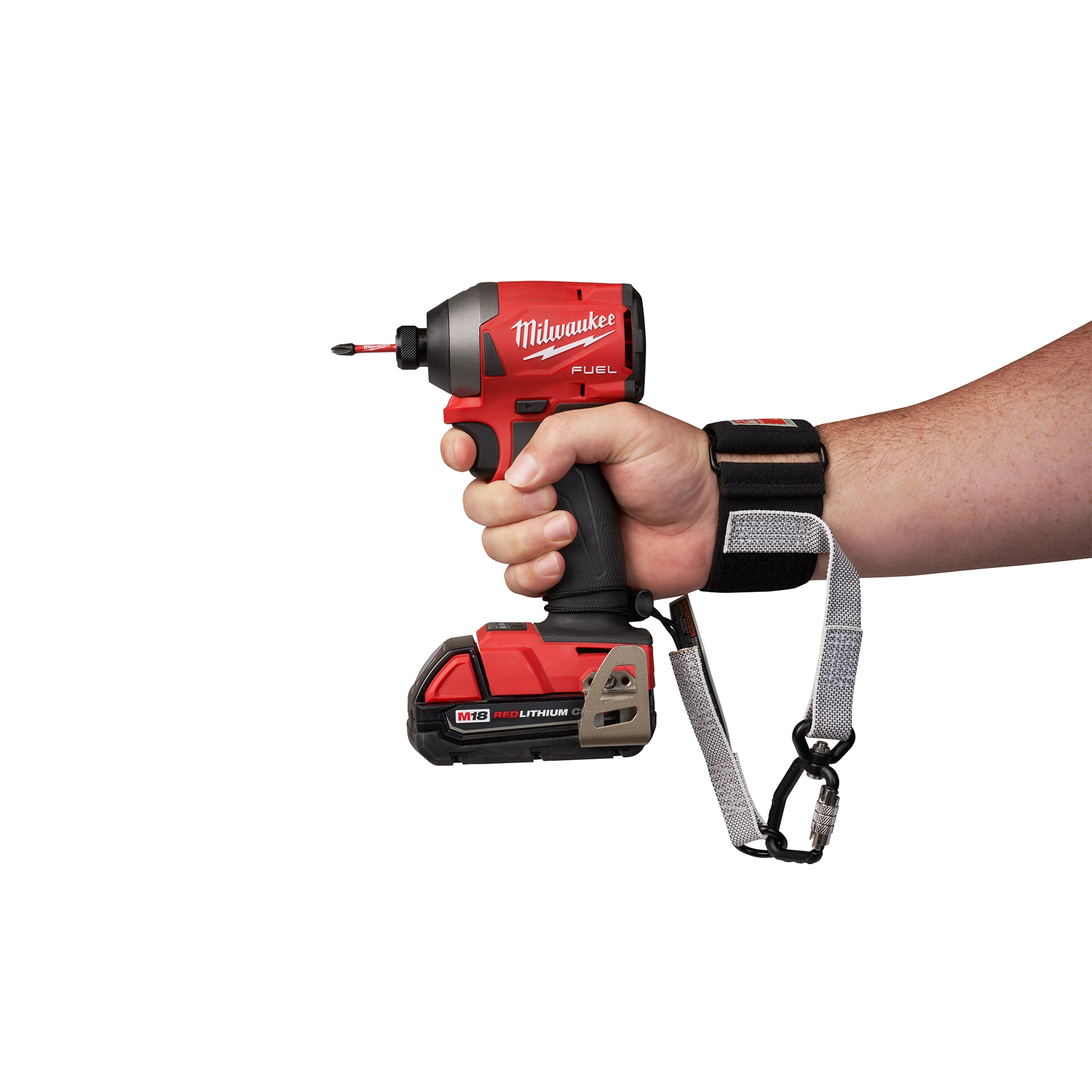 A person's hand grips a red cordless power drill, secured with a Quick-Connect Wrist Lanyard attached to their wrist.