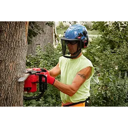 Worker wearing the BOLT Full Face Shield Metal Mesh for protection from debris