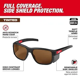 Milwaukee safety glasses feature high contrast brown tinted lenses with an anti-scratch hard coat. They include removable side shields for debris protection and soft temple arms for extended wear comfort. The glasses meet ANSI Z87.1+ standards for full coverage and side shield protection.